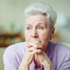 Close-up portrait of sad older woman