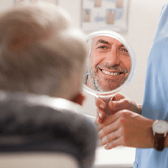 Denture dentist in Cleveland showing patient smile
