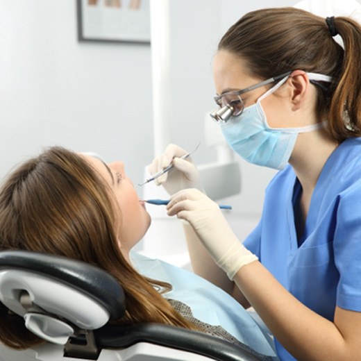 patient under sedation visiting dentist 