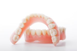 Upper and lower dentures in Cleveland, TX.